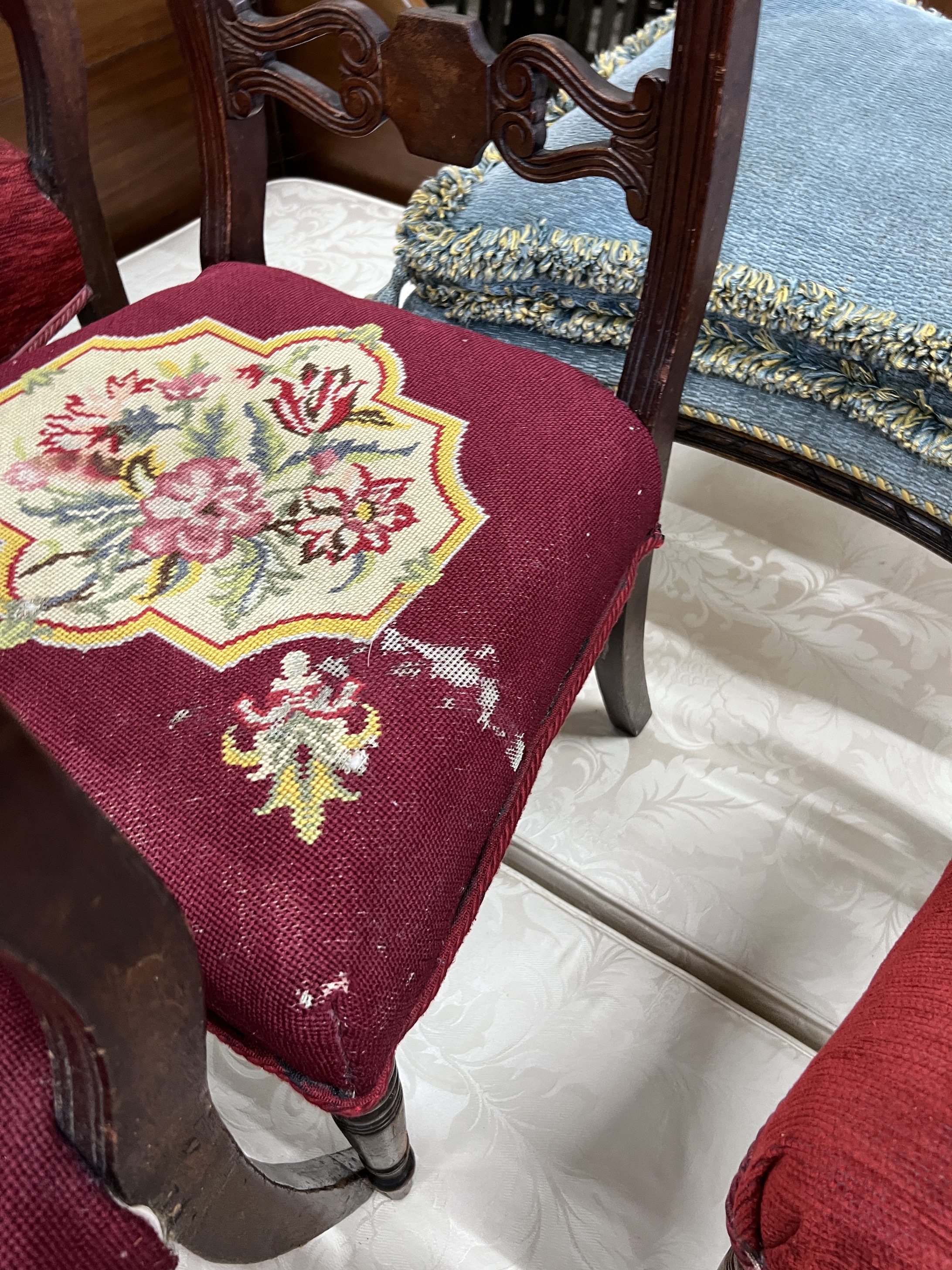 A harlequin set of six Regency mahogany dining chairs, two with arms